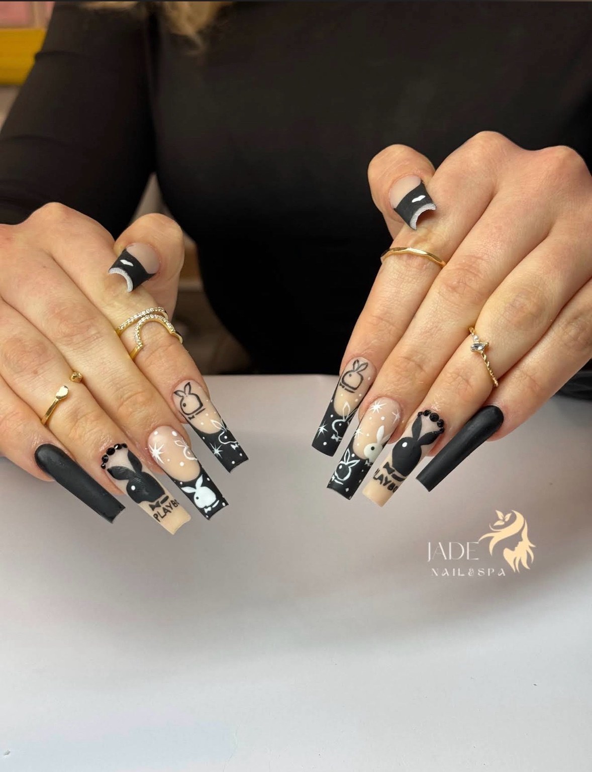 Black and nude designer nail art